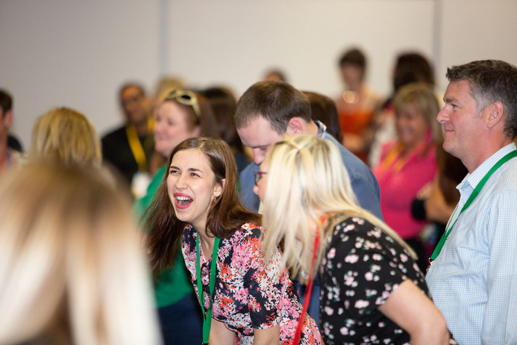 Women and men working together at an event